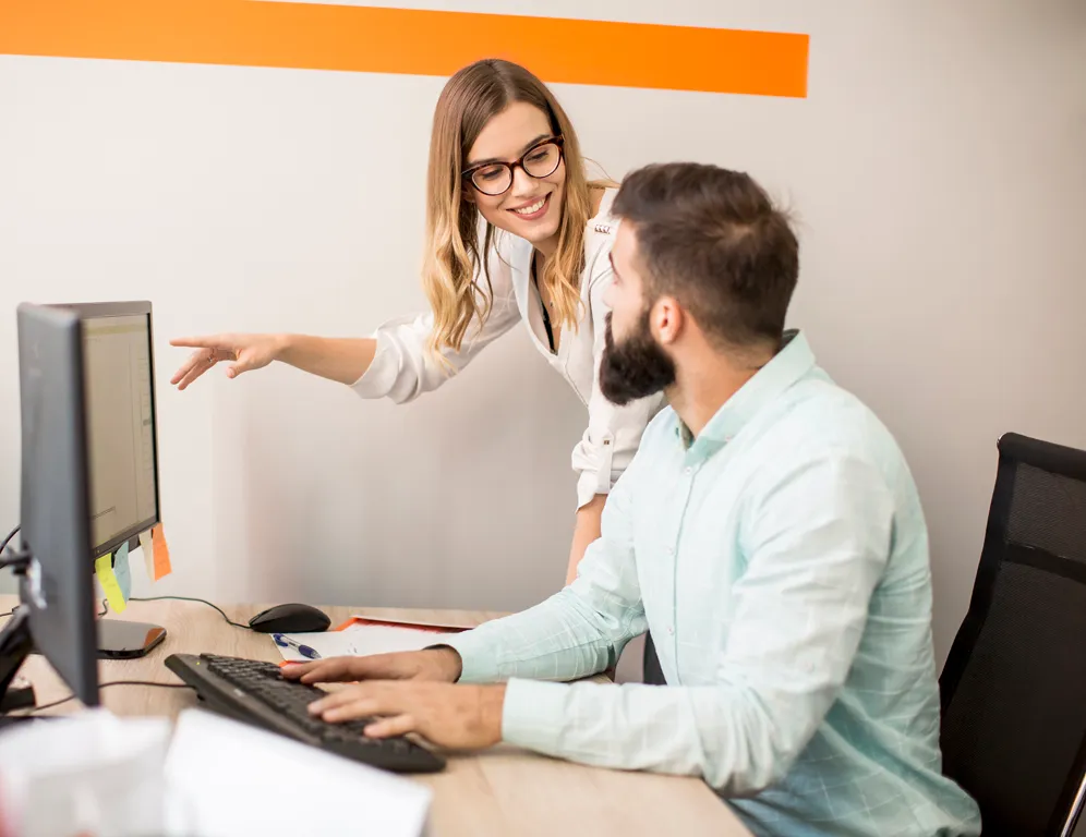 Career consultants reviewing a work plan with a candidate