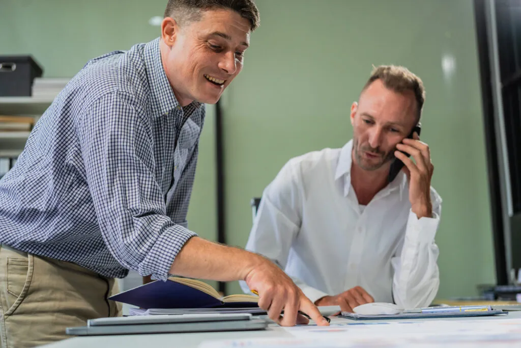 Professionals discussing a role together