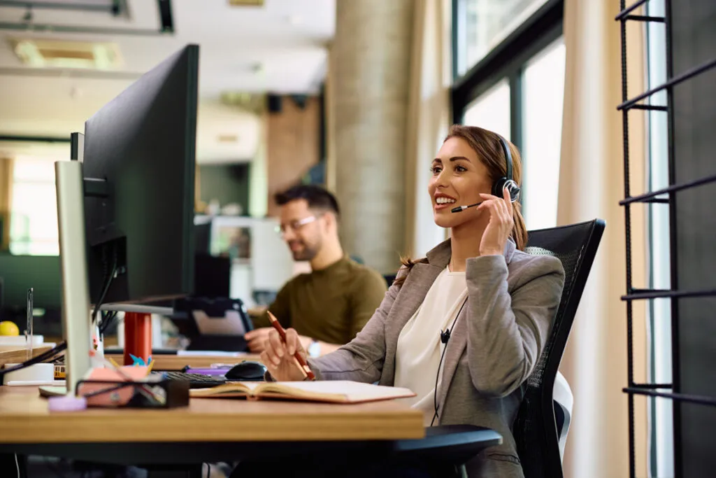 Customer service representative speaking with a client